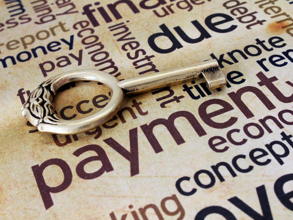 Golden key on payment text